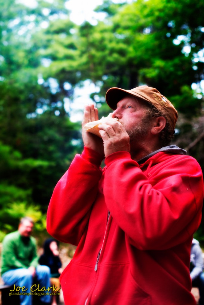 Norm Wheeler starts the bards with his conch shell by Joe Clark www.glasslakesphotography.com